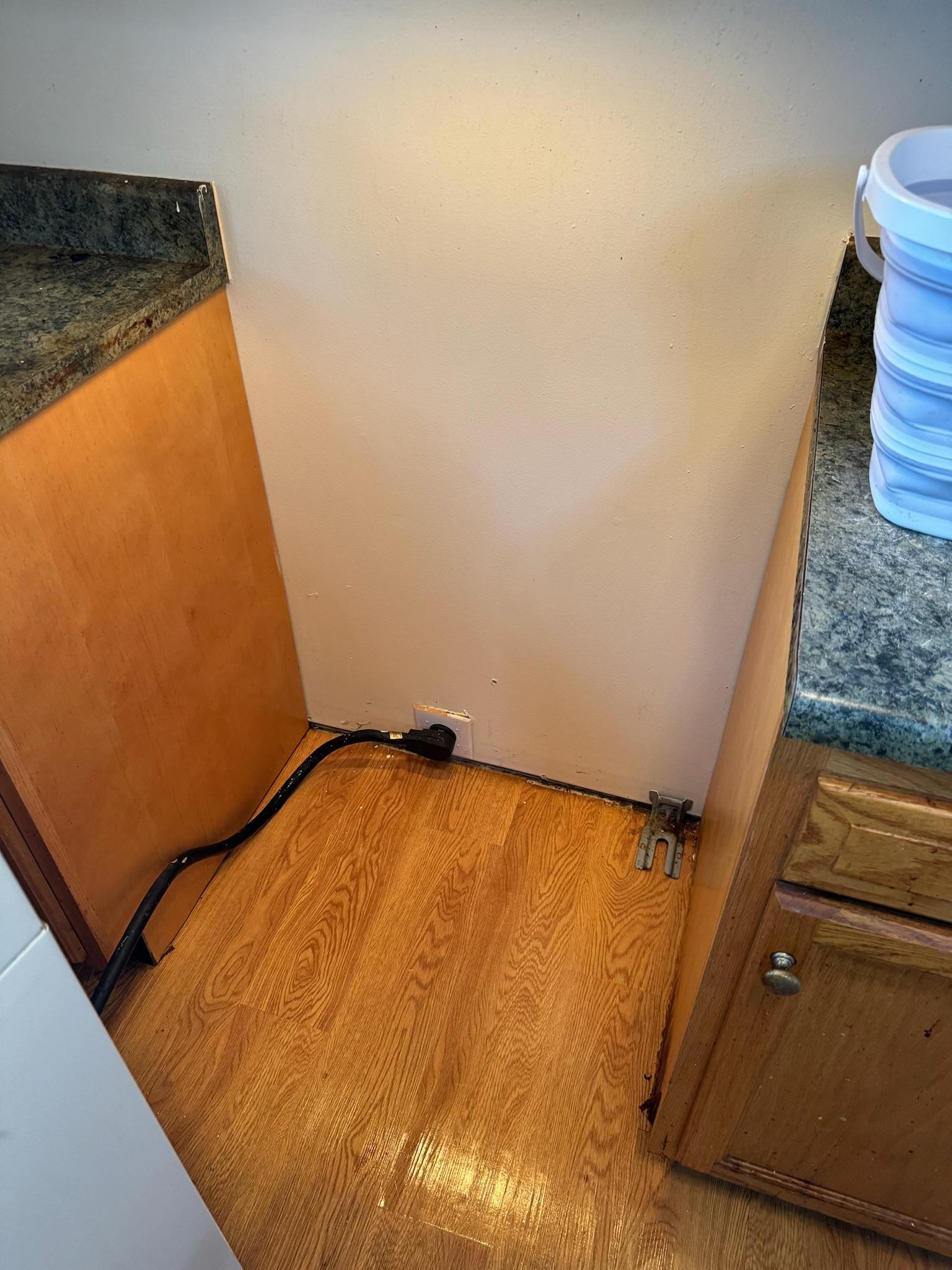 The same hardwood floor after cleaning, swept and mopped back to a clean finish